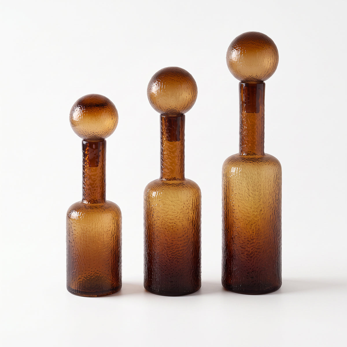 Set de Botellas Decorativas Vidrio Ámbar (45,50 & 56)